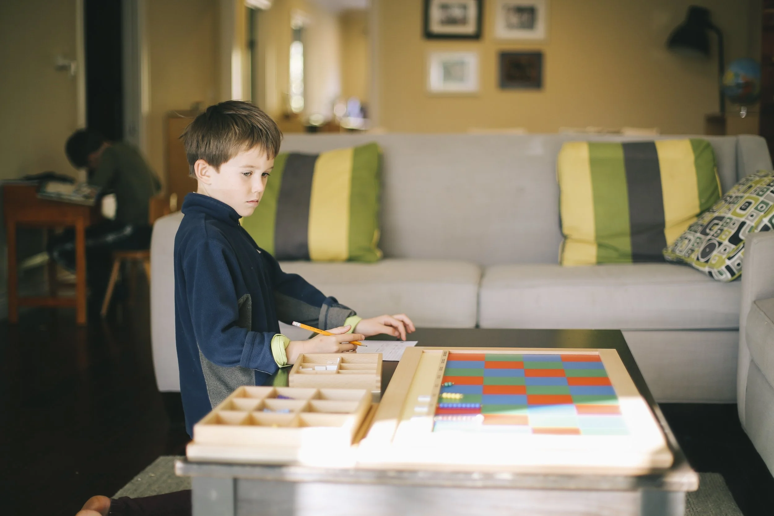 Students working in Montessori classroom